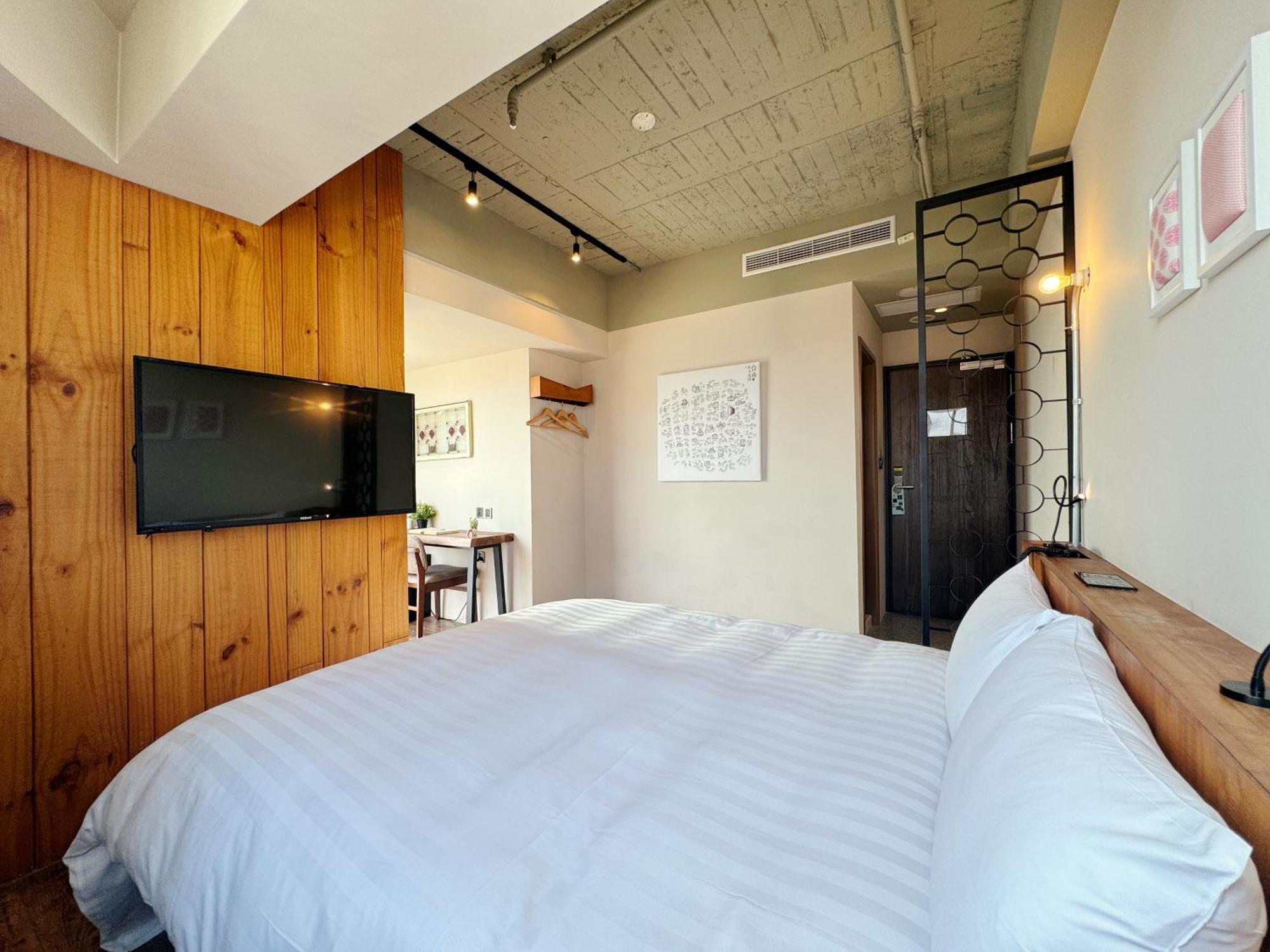 Roaders Hotel Tainan Chengda Номер фото